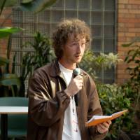 Man speaking with book